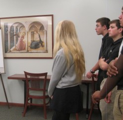 An SHG tour group admires Fra Angelico's painting of the Annunciation. Photo courtesy of Sabrina Johnston.